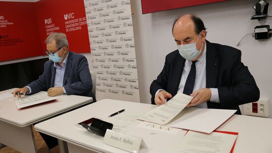 Un moment de la signatura del conveni